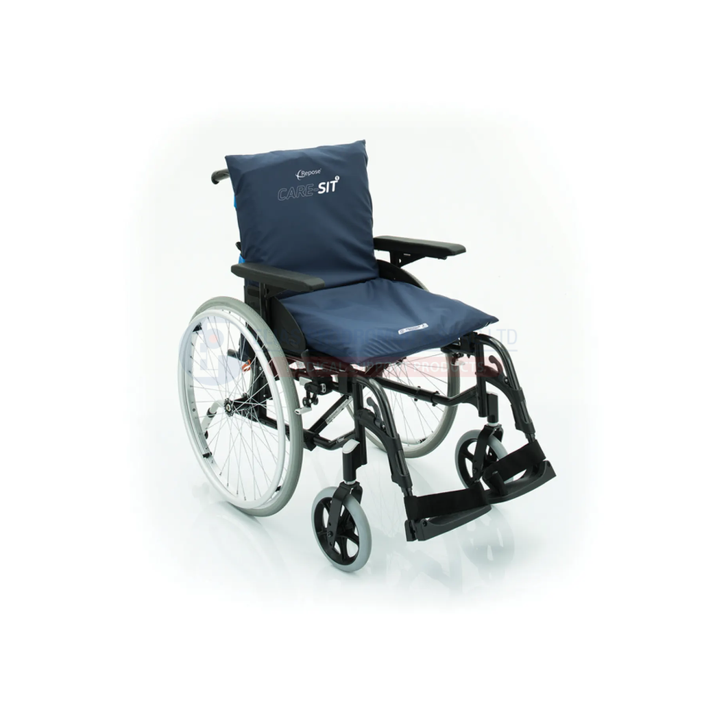 Care-Sit fitted to a general-purpose wheelchair. Representative Care-Sit shown with its required cover fitted; selected inner set is 45 cm. Cover and chair are not included.