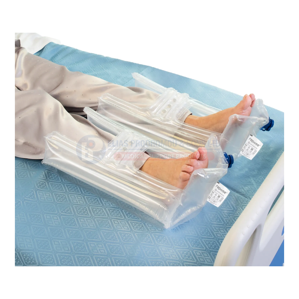 A pair of Foot Protector PLUS supports fitted on a bed. Standard family fitting view; selected PLUS size is Small.